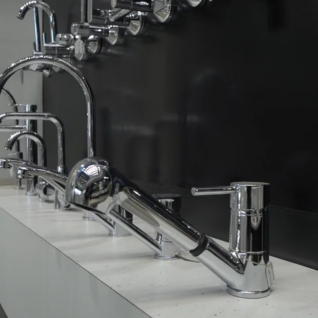 Premium faucets and mixers on a marble display